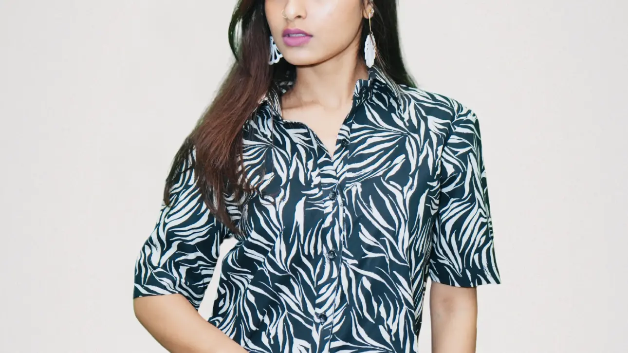 Model wearing Raaya resort wear – breathable cotton summer outfit with eucalyptus design